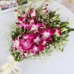 Send Anniversary Gift Bouquet of Six Purple Orchids To Kolkata