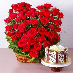 Anniversary Heart Shaped Arrangement - Arrangement of 50 Red Roses with Half Kg Chocolate Cake