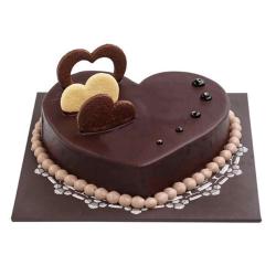 Anniversary Exclusive Gift Hampers - One Kg Eggless Heart Shape Chocolate Cake