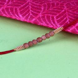 Handmade Rakhis - Sandalwood Rakhi with Zardosi work