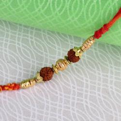 Rudraksha Rakhis - Golden Beads with Rudraksha Rakhi