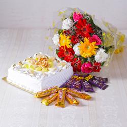 Send Flowers Gift Bouquet of Mix flowers with Square Shape Pineapple Cake and Assorted Chocolates To Faridabad