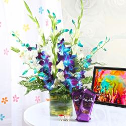 Holi Bhaidooj Tikka - Holi Tikka with Silk Chocolate Treat and Orchids Vase