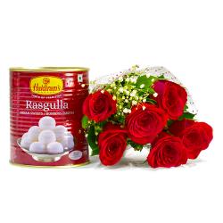 Send Six lovely Red Roses Bouquet with Rasgullas To Kollam