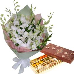 Dussehra - 10 Elegant White Orchids & Assorted Sweets Pack