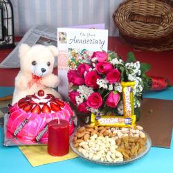 Send Anniversary Eggless Strawberry Cake Hamper To Ulhasnagar