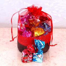 Send Truffle with Home Made Chocolate Basket Pouch To Dharwad