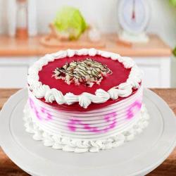 Send Half Kg Round Strawberry Cake To Karnal