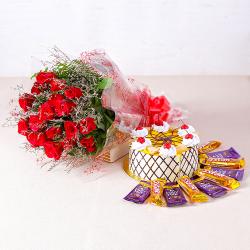 Bhai Dooj Return Gifts for Sister - Eighteen Red Roses with Pineapple cake and Bars of chocolates
