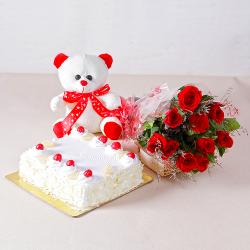 Send Ten Romantic Red Roses with One Kg Pineapple cake and Teddy Bear To Goa