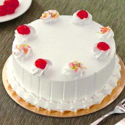 Half Kg Cakes - Floral Round Vanilla Cake