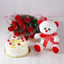 Sorry Gifts for Her - Forever Red Roses with Half kg Pineapple cake and Soft Toy