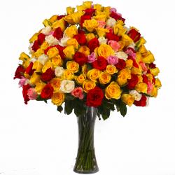 Send Multi Color 100 Roses Arranged in a Vase To Kolkata