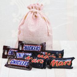 Send Chocolates Gift Snikers and Mars Chocolate in a Potli To Kupwara