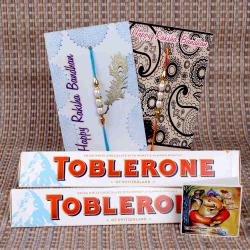 Set Of 2 Rakhis - Swiss White Toblerone Chocolate with Pearl Rakhi