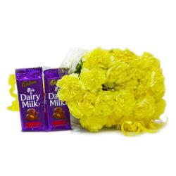 Flower Hampers for Her - Bunch of 20 Yellow Carnations with Cadbury Fruit and Nut Chocolate Bars