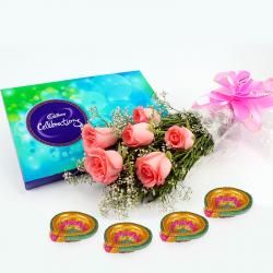Diwali Gifts to Visakhapatnam - Pink Roses with Cadbury Celebration N Diwali Diya