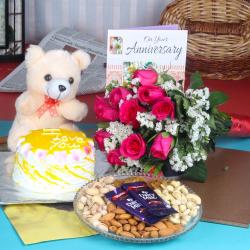 Send Anniversary Eggless Pineapple Cake Combo To Mumbai