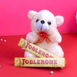 Womens Day Express Gifts Delivery - Toblerone Chocolate with Cuddly Teddy Bear