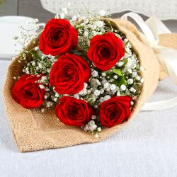 Send Wedding Gift Exclusive Romantic Red Roses Bouquet To Hyderabad