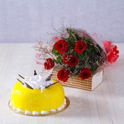 Cake Hampers - One kg Pineapple Cake with Six Red Roses Hand Tied Bouquet