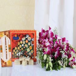 Kundan Rakhis - Kaju Katli with Rakhi and Orchids Bouquet