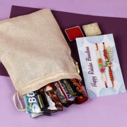 Send Rakhi Gift Imported Chocolates with Two Rakhis To Bhopal