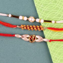 Set Of 3 Rakhis - Pearl Om and Wooden Beads Rakhis