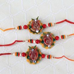 Rakhi Sets - Set of Three Swastika Kalash Floral Rakhi