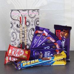 Rakhi Gifts for Brother - Assorted Cadbury Chocolate and Set of Two Rakhi.