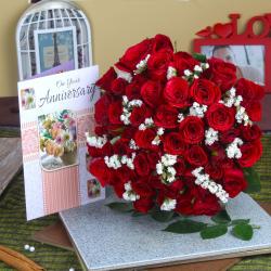 Send Red Roses Bunch with Anniversary Greeting Card To Manipal