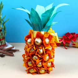 Send Special Pineapple Homemade Chocolates Treat To Delhi