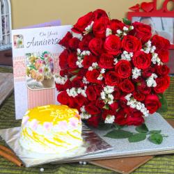 Send Anniversary Red Roses Bouquet and Pineapple Cake with Greeting Card To Mahe