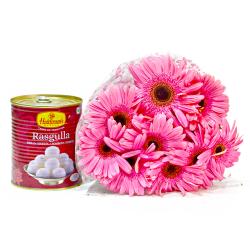 Send Bouquet of Ten Pink Gerberas with Tempting Rasgullas Sweet To Blimora