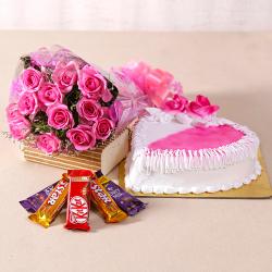 New Year Midnight Special Gifts - Hearty Strawberry Cake and Pink Roses Combo