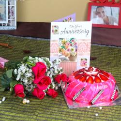 Send Roses with Strawberry Cake and Anniversary Card To Mahaboob Nagar