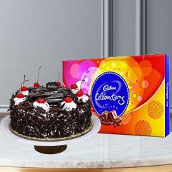 Send Cakes Gift Half Kg Black Forest Cake With Cadbury Celebration Pack To Moradabad