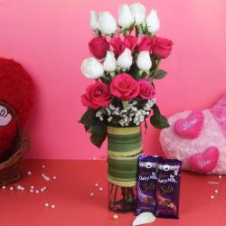 Vase Arrangement - Glass Vase of Pink and White Roses and Chocolates