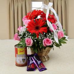 House Warming Gifts - Mix Flowers Arrangement with Cadbury Dairy Milk Chocolate and Rassogulla