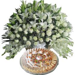 Flowers with Sweets - 1 Kg Sweets with Exotic Arrangement