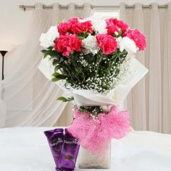 Sorry Gifts for Wife - Tasty Cadbury Silk Chocolates and vase of Carnations Combo