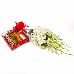 Send Exotic Orchids Bouquet and Assorted Indian Sweet Box To Sitapur