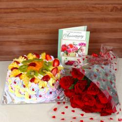 Send Anniversary Red Roses Bouquet Combo with Greeting Card and Mix Fruit Cake To Ropar