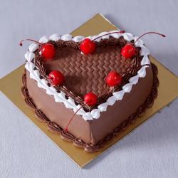 Send Cakes Gift Eggless Chocolate Heart Shape Cherry Cake To Hyderabad