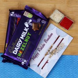 Rakhi With Chocolates - Two Fancy Rakhis with Two Imported Dairy Milk Chocolates