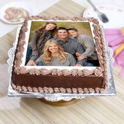 Send Rakhi Gift One Kg Photo Chocolate Cake Treat To Bangalore