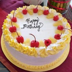 Send Cakes Gift Two Kg Eggless Pineapple Cake To Bangalore