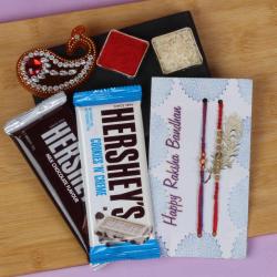 Send Rakhi Gift Two Rakhi Threads and Hersheys Two Chocolate Bars To Jamshedpur