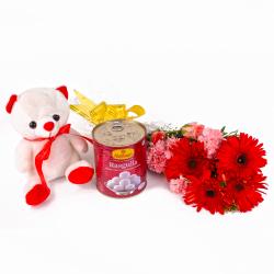 Mithai Hampers - Rasgulla with Fresh Carnations and Gerberas Bouquet with Soft Toy Combo