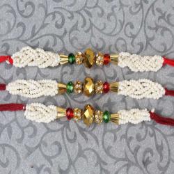 Send Rakhi Gift Set of 3 Moti Rakhi To Surat